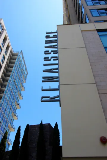 This building shows modern architecture and sits in the sun in Downtown San Diego