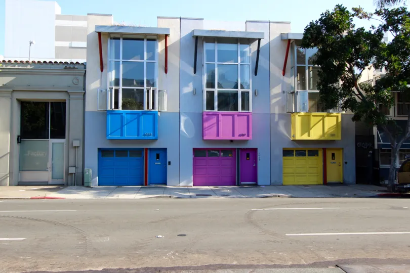Purple, yellow and blue garage doors at Rowhomes on F in downtown San Diego CA