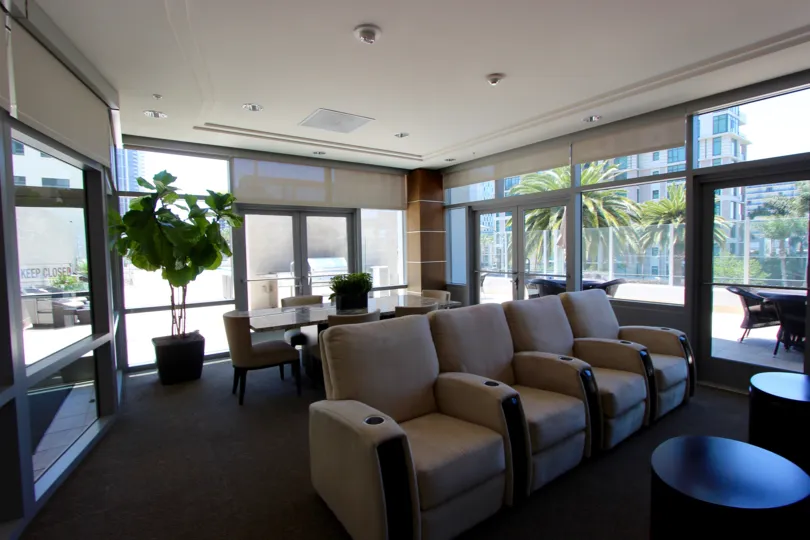 A comfortable common room in Sapphire Tower, complete with conference table and reclining chairs.