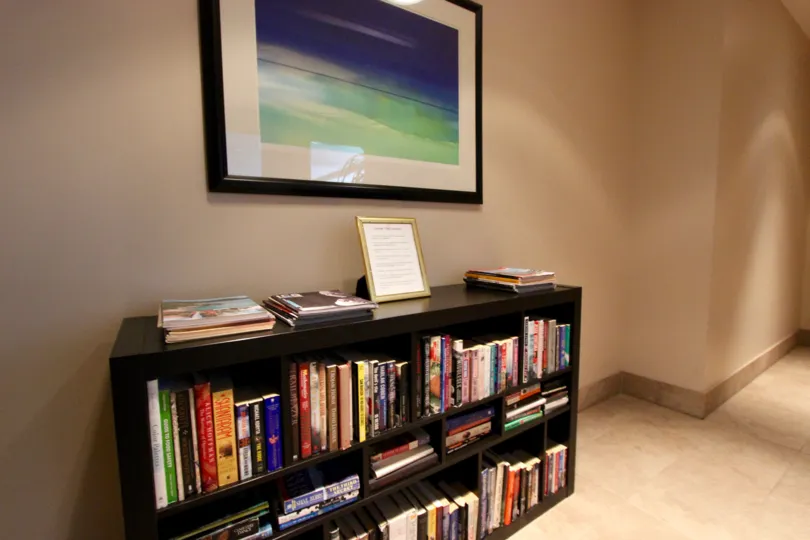 A bookcase in the hall in the Sapphire Tower in the Downtown San Diego area of CA.