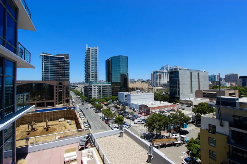Top view from the building with lot of cars and trees in Sapphire Tower