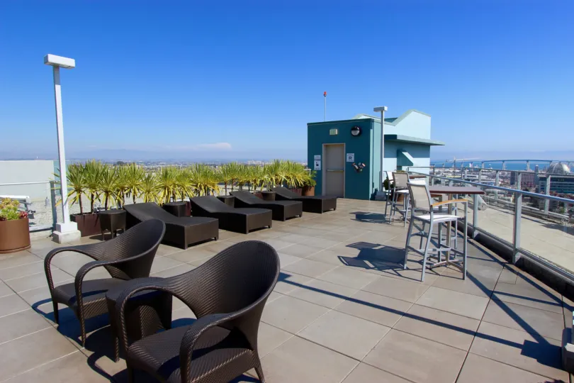 Rooftop loungers and chairs overlooking the bridge at Smart Corner in Downtown San Diego, California