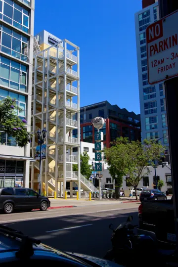 A large building with multiple floors meant for parking in Smart Corner community.