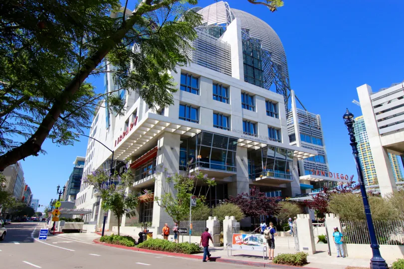 A sunny day in the area of Smart Corner, outside, people, windows, street, traffic signs