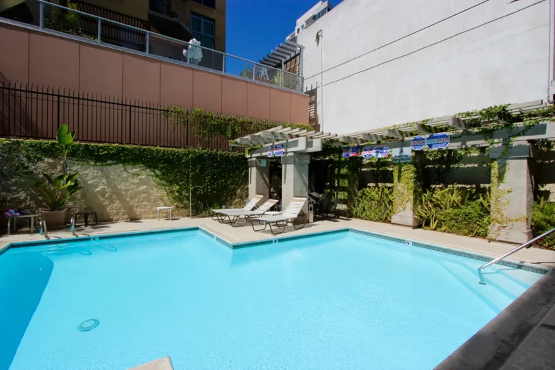 A sunny day in the Symphony Terrace with the chairs and swimming pool in Downtown San Diego, CA