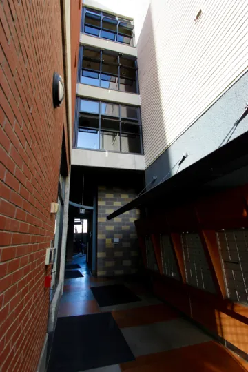 Entryway to The Lofts @ 777 Sixth with mailboxes and windows in downtown San Diego
