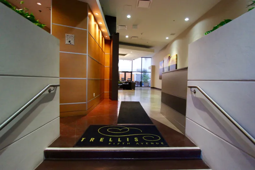 An illuminated interior of Trellis building in San Diego, California