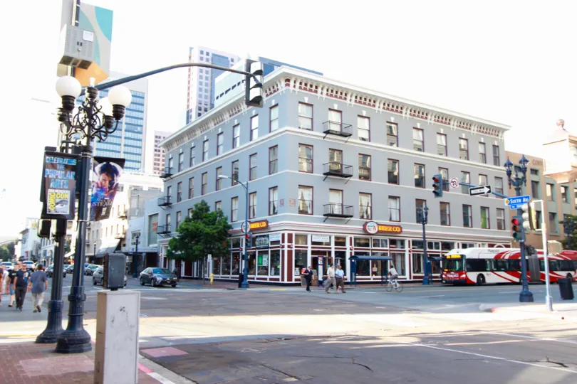 A sunny day in the area of Union Square, outside, people, bicycle, traffic lights