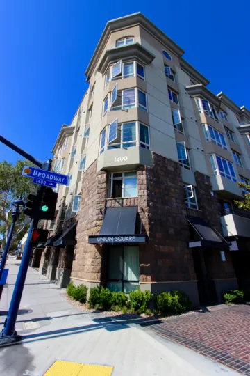 Upper profile of mutli-story complex corner property at Union Square, Downtown San Diego, CA