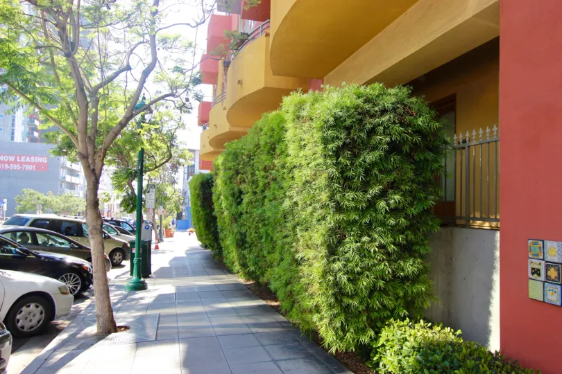 The shaded sidewalk on a sunny day of the Village walk downtown San Diego, Ca.