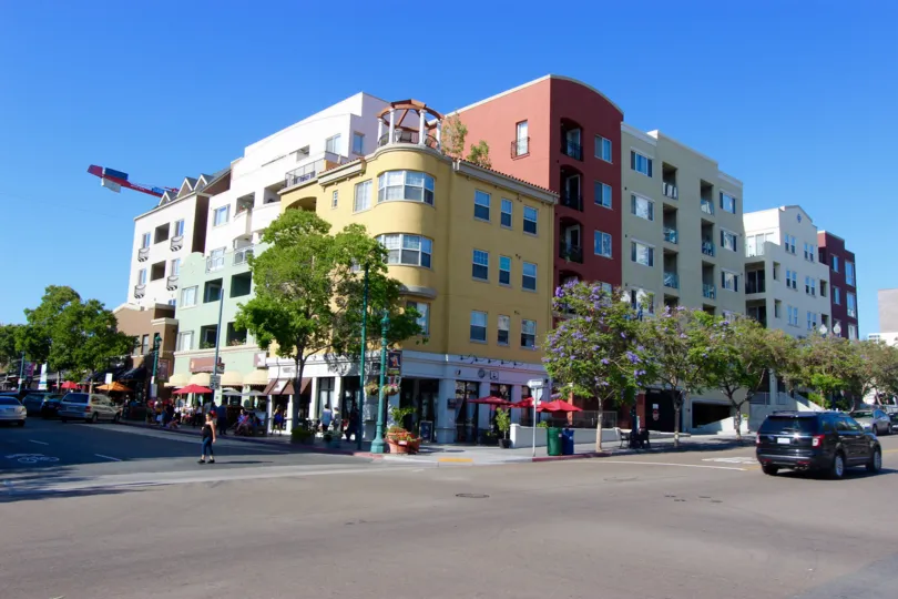 A busy street corner on a sunny and beautiful day in Downtown San Diego, California