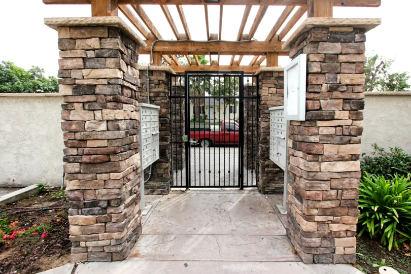 Black iron gate at arbors of Oakdale in El Cajon California