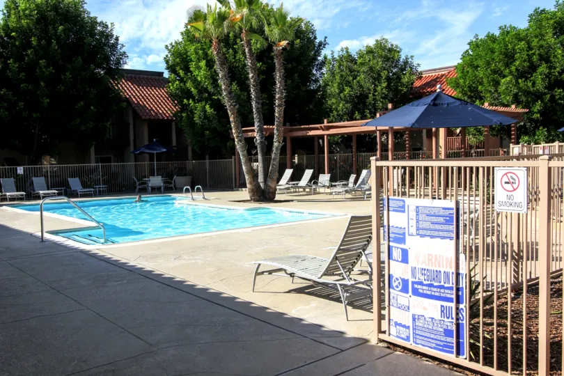 A sunny day at the pool of the Artesia housing community