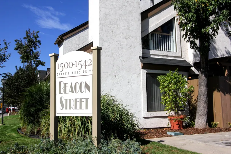 A white home on a clear, blue day on Beacon Street, a neighborhood in El Cajon, California