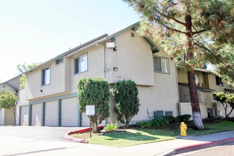 Two story residential units with driveway at Centaur Villas in El Cajon California