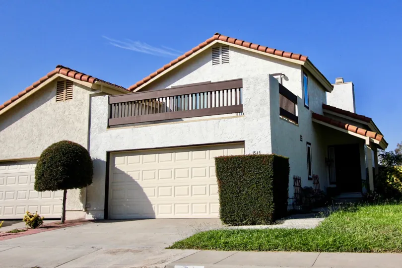 Two story housing with railing at Cottonwood Meadows in El Cajon California