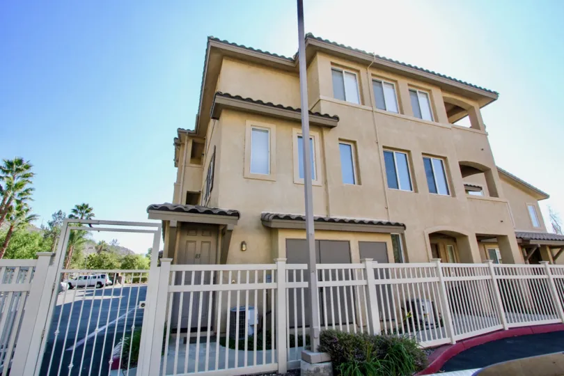Gated community entrance with hills back drop of Fairway Villas.