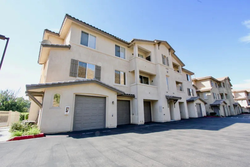 Three story housing units with garages at Fairway Villas in El Cajon California