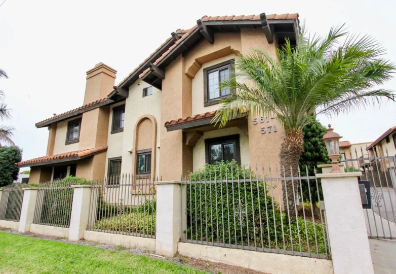 VERY BEAUTIFUL HOUSE. IN FRONT OF IT THERE IS A LAWN. GREENERY IS EVERY WHERE.