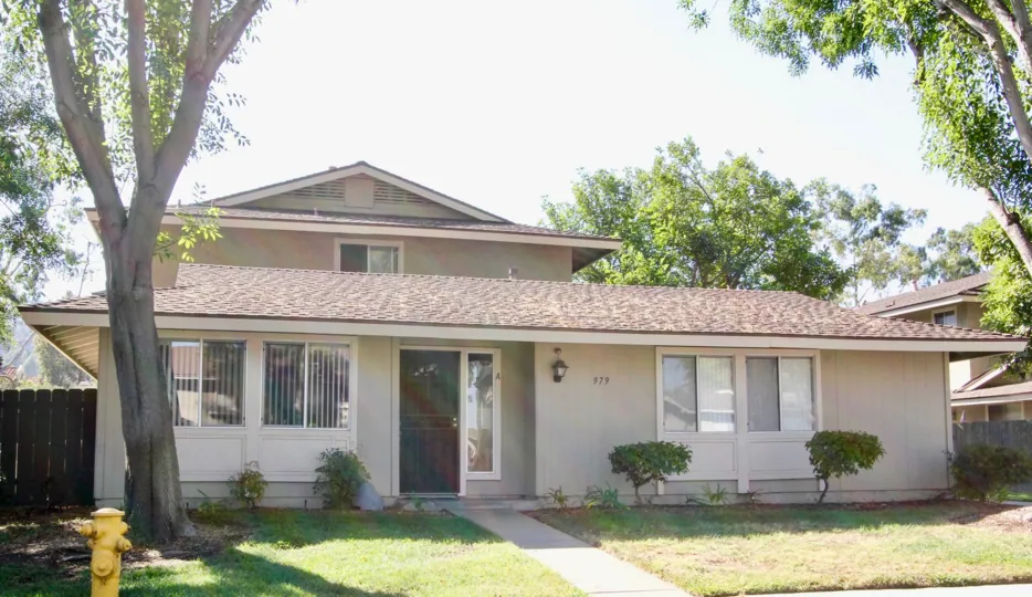 VERY BEAUTIFUL HOUSE. IN FRONT OF IT THERE IS A LAWN. GREENERY IS EVERY WHERE.