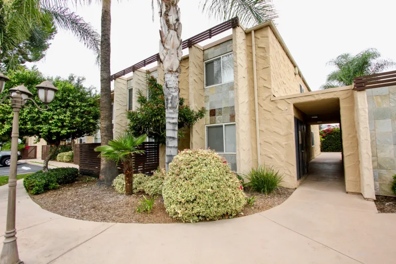 Two story modern home in La Quinta Gardens with landscaped front yard