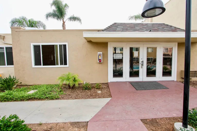 Madison Ave Condos El Cajon California house with large PVC doors