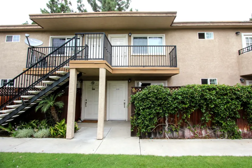 VERY BEAUTIFUL HOUSE. IN FRONT OF IT THERE IS A LAWN. GREENERY IS EVERY WHERE.