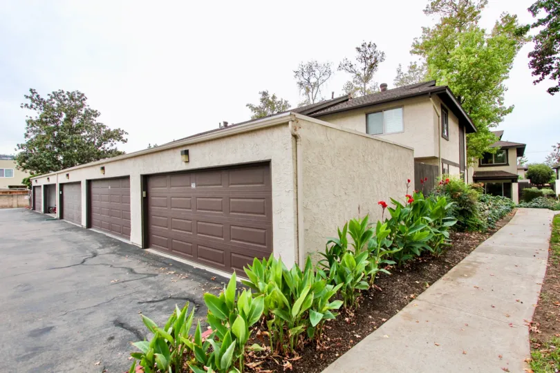 Garages behind residential units at Mollison Villas in El Cajon California