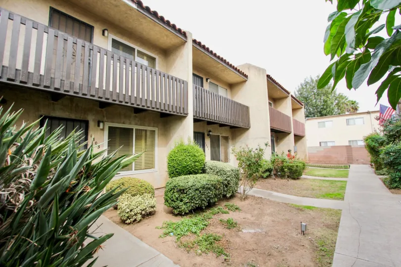 Beautiful wooden planks balcony with bushes in Oakdale Park.