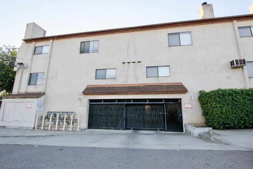 A gated back entrance to the Palaie Royal housing community in Califronia.
