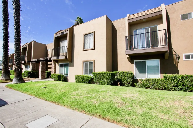 A view of the beautiful landscaping and exterior of Palermo, El Cajon, California
