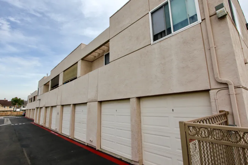 Garage view of the Palm Court housing community apartments