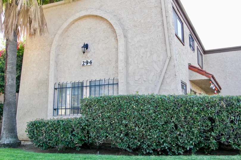 Clay colored house with the number 294 in the Park Lane community.