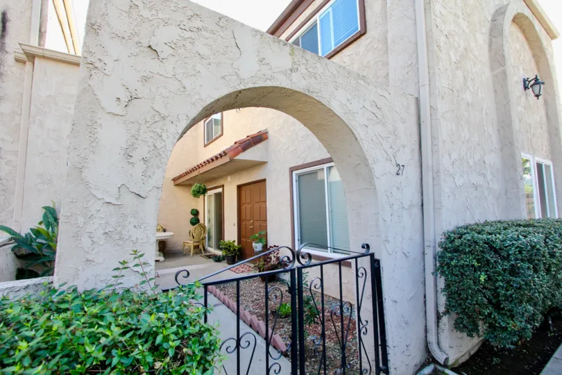 chair door black gate greese tree pipe lamp window compound home nun 27 house enterance sky sandal colour paint