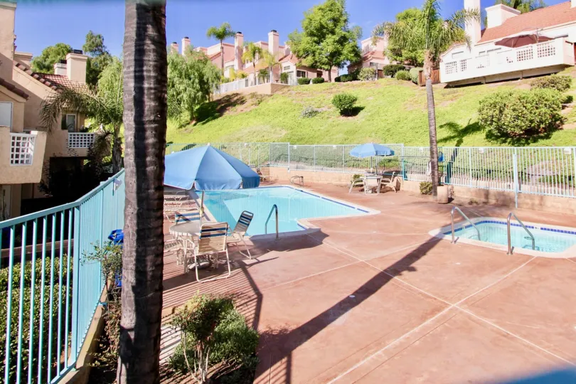 A BEAUTIFUL SWIMMING POOL WITH FULL OF WATER IN A VILLA