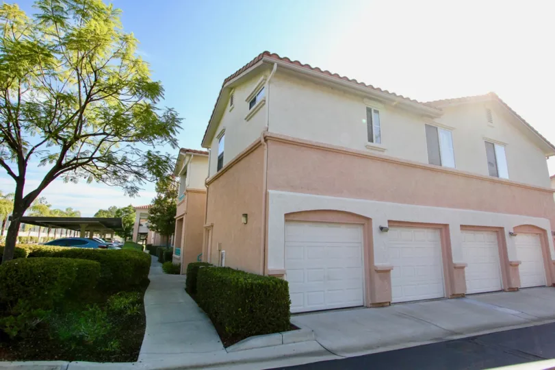 Four garages attached to residence at Remington in El Cajon California