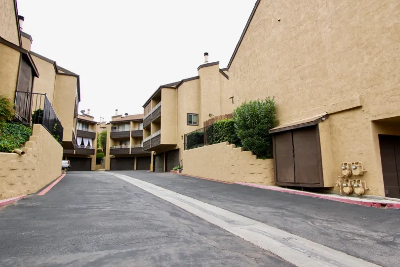 A suuny strret in the Stone Edge neighborhooc, apartment complex