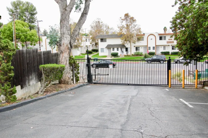 The gate at Stone Edge neighborhood, El Cajon, CA, with the street in the background