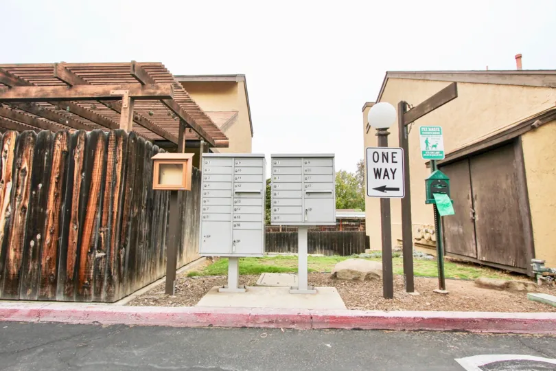 Letter boxes near wooden house in Stone Edge California