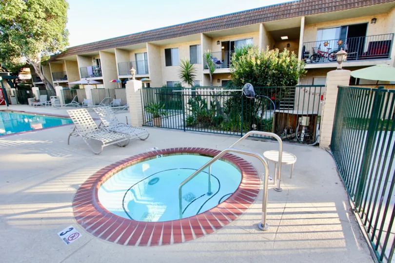 A sunny day in Sunterra has children' pool and adults pool with chairs