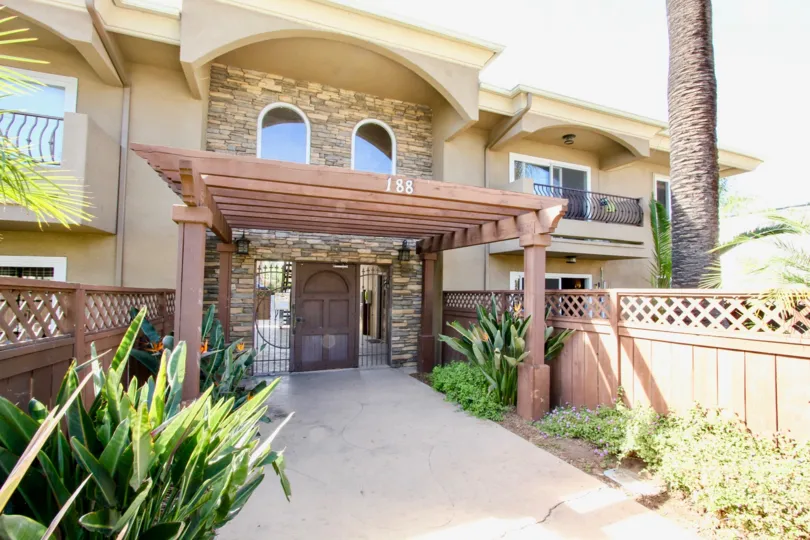 A wooden entry right before entering the housing area at the willows.