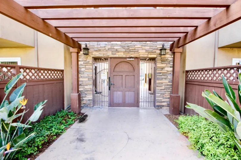 A sunny day at the entrance of The Willows apartments