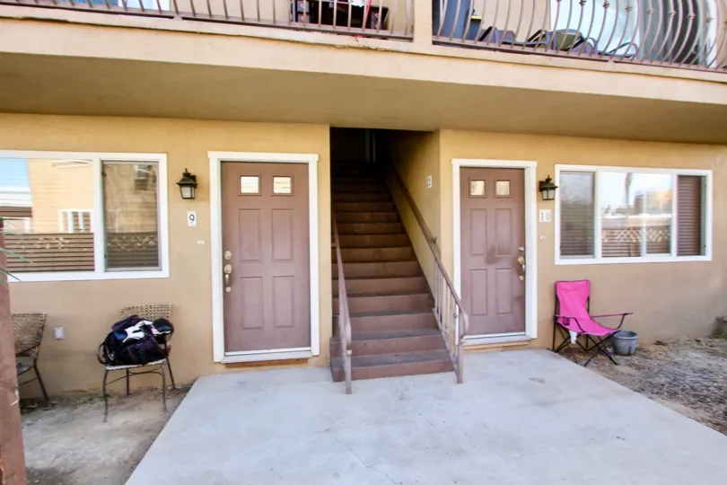 A BEAUTIFUL HOUSE AND A NICE FURNITURE IN FRONT OF THE HOUSE