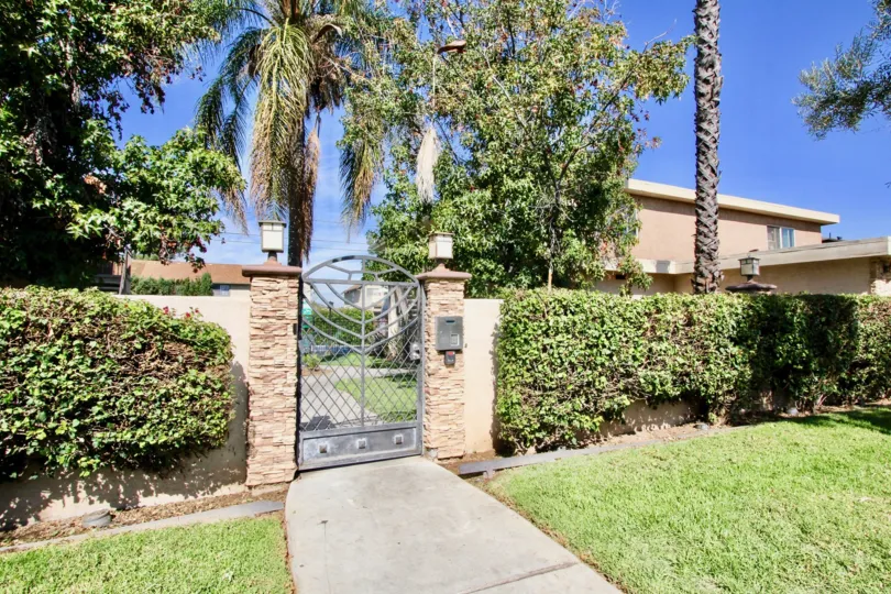 Tres Palmas El Cajon California house with large metalic door for entrance