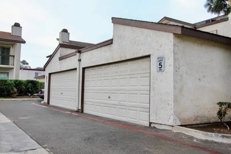 Garages in alleyway at Villa Madera in El Cajon California