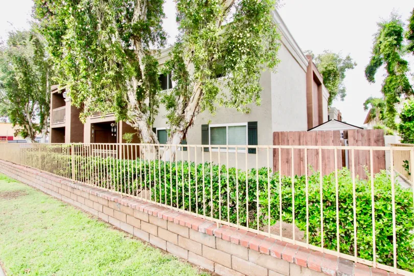 Apartments behind metal fence at Windsor Terrace in El Cajon California