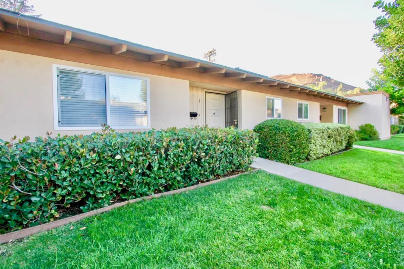 Housing with yard and walkway at Winter Garden Village in El Cajon California