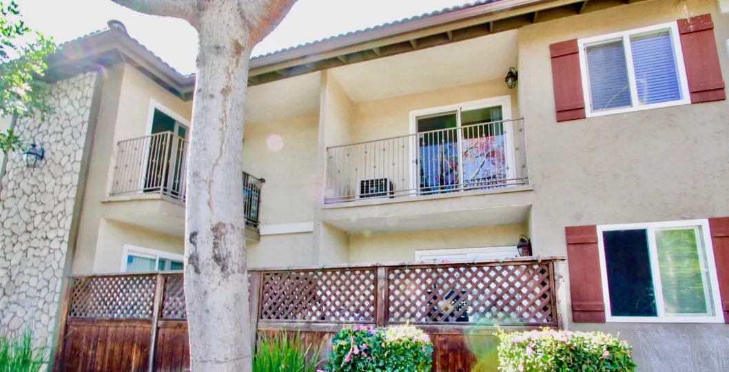 Two story housing with balcony at Woodland Village in El Cajon CA