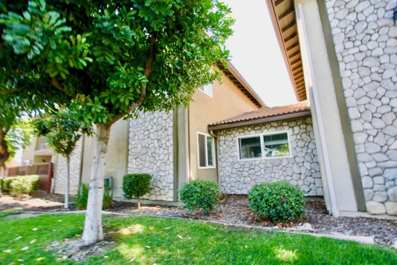 Stone housing and trees at Woodland Village in El Cajon California