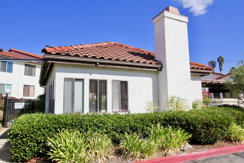 Housing near green plants with fireplace at Adoble HIlls in Escondido California